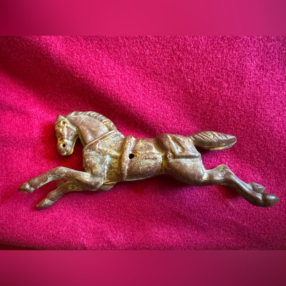 Cast metal horse from a child’s toy?